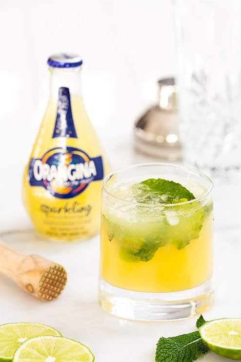 Orangina - Citrus Sparkling Juice Beverage - Light Pulp - Original Imported European French Recipe - No Artificial Ingredients - (Pack of 24) (11.2 oz Can)